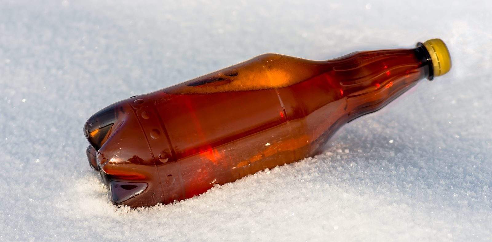 Beer In Plastic Bottles On Snow